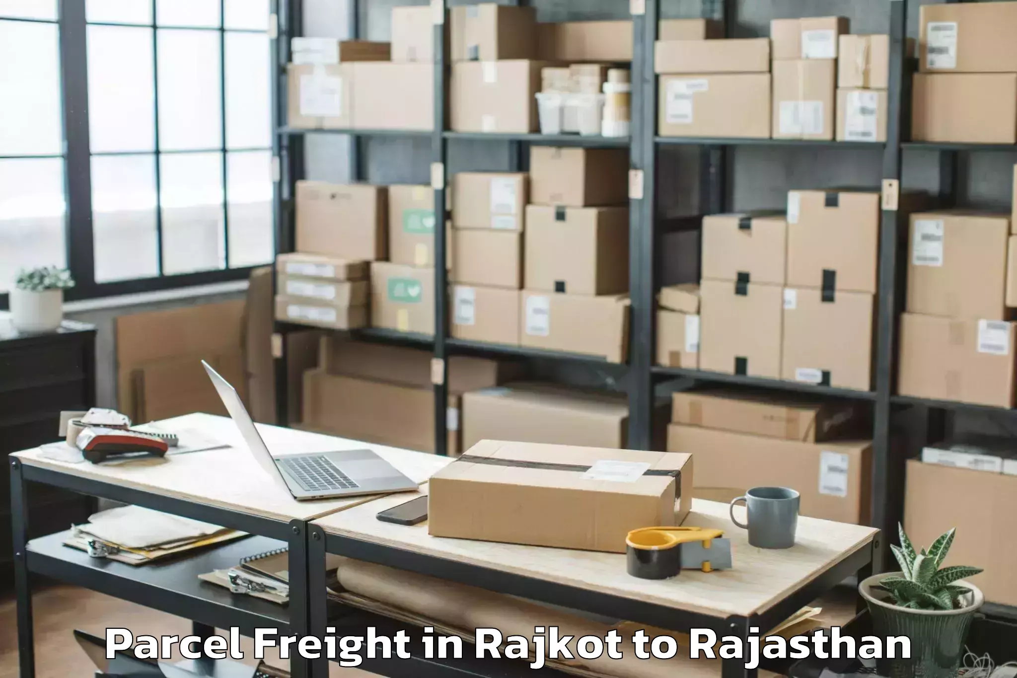 Professional Rajkot to Khairthal Parcel Freight